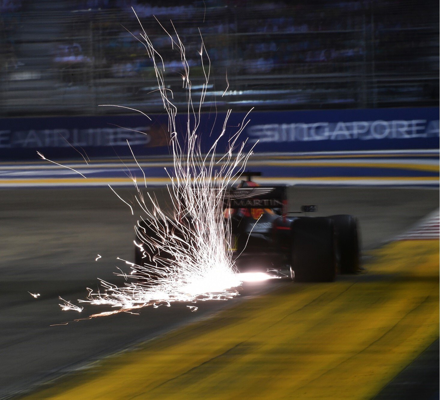 Sparks emitting from cars at the Marina Bay Street Circuit-1